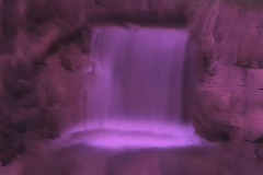 Time Ghosted Organically Blurred Garden Waterfall with Magenta Tint Loop