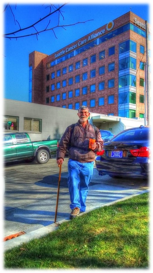 Grant standing on the curb in front of SCCA